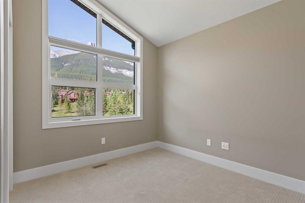 407 Riva Place, Canmore, AB - Indoor Photo Showing Other Room