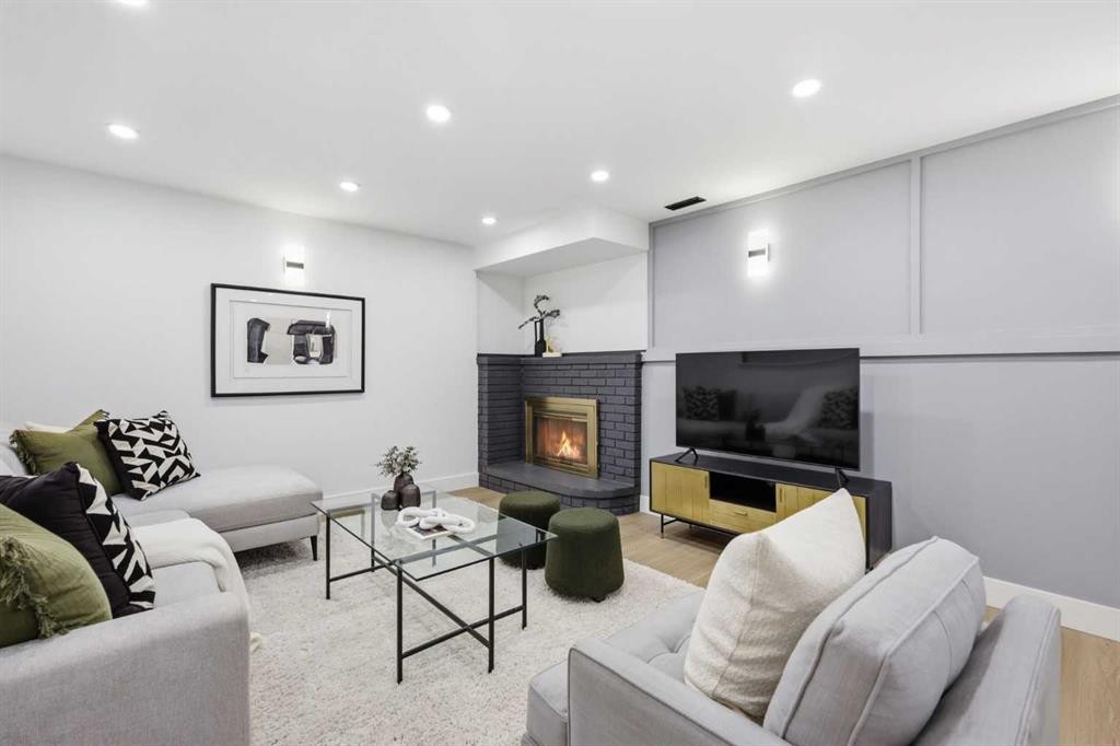 928 120 Avenue Se, Calgary, AB - Indoor Photo Showing Living Room With Fireplace