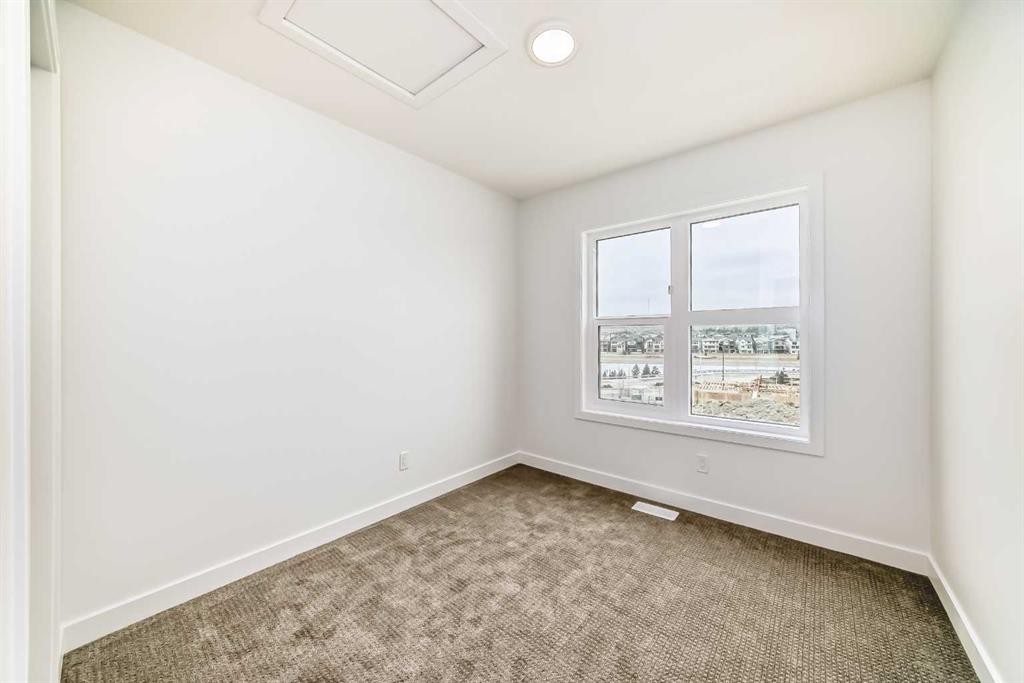103-30 Rochester View Nw, Calgary, AB - Indoor Photo Showing Other Room