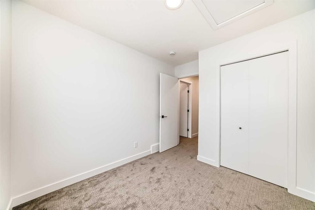 103-30 Rochester View Nw, Calgary, AB - Indoor Photo Showing Other Room