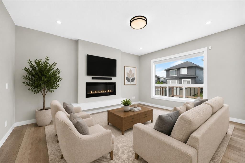 137 Creekside Way Sw, Calgary, AB - Indoor Photo Showing Living Room With Fireplace