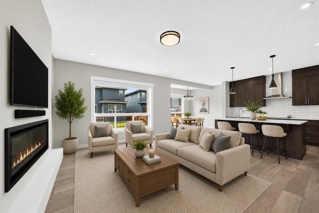 137 Creekside Way Sw, Calgary, AB - Indoor Photo Showing Living Room With Fireplace