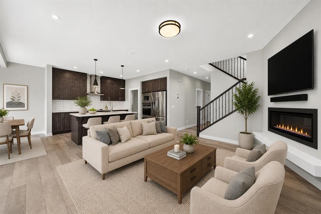 137 Creekside Way Sw, Calgary, AB - Indoor Photo Showing Living Room With Fireplace