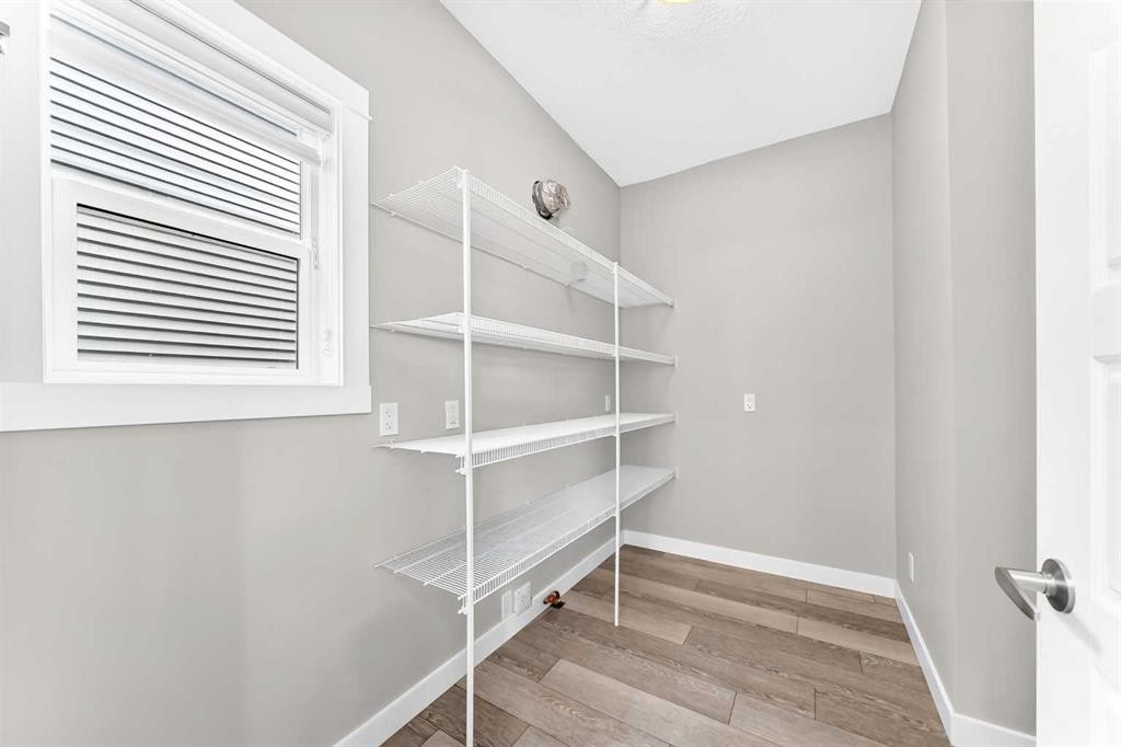 137 Creekside Way Sw, Calgary, AB - Indoor With Storage