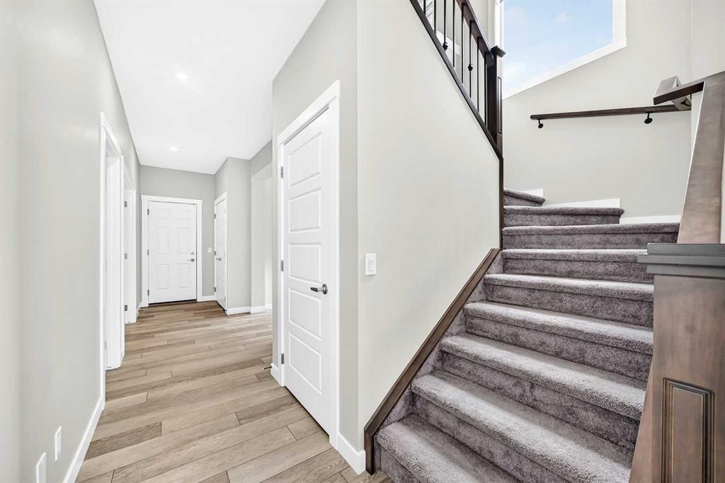 137 Creekside Way Sw, Calgary, AB - Indoor Photo Showing Other Room