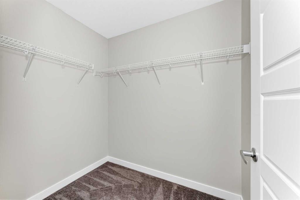 137 Creekside Way Sw, Calgary, AB - Indoor With Storage