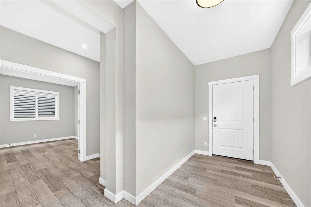 137 Creekside Way Sw, Calgary, AB - Indoor Photo Showing Other Room