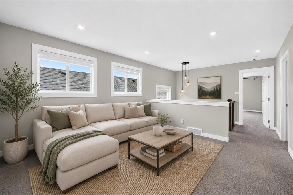 137 Creekside Way Sw, Calgary, AB - Indoor Photo Showing Living Room