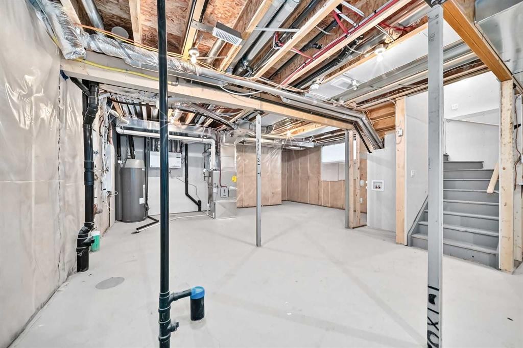 137 Creekside Way Sw, Calgary, AB - Indoor Photo Showing Basement