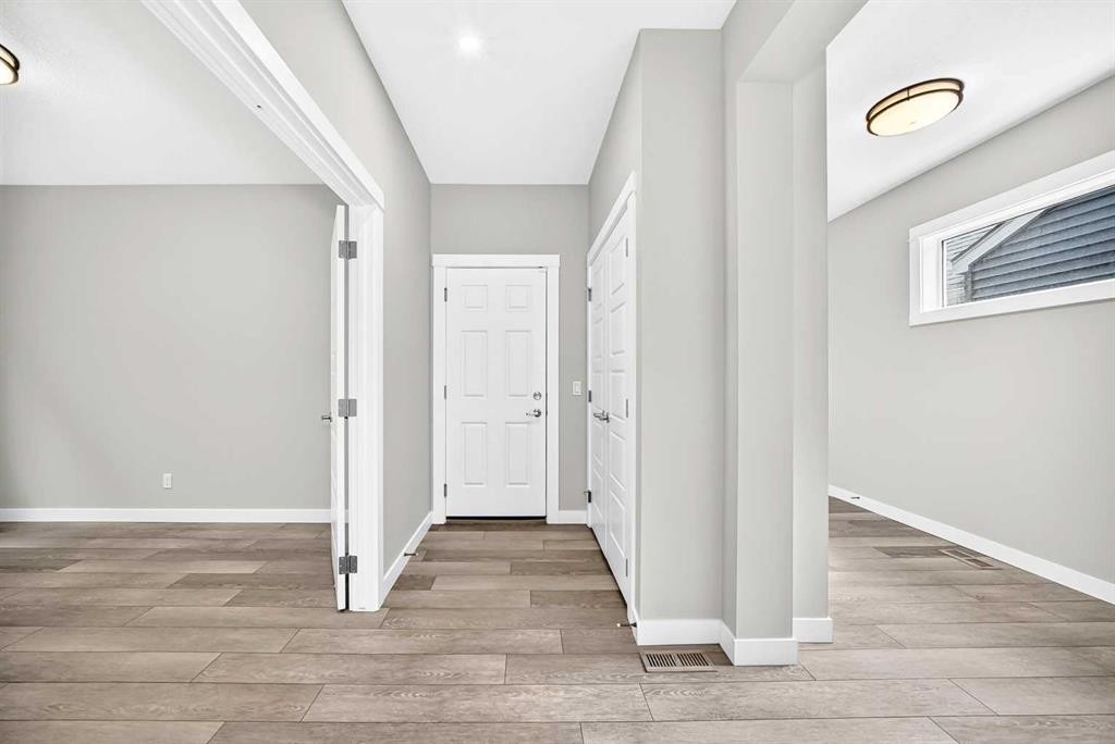 137 Creekside Way Sw, Calgary, AB - Indoor Photo Showing Other Room