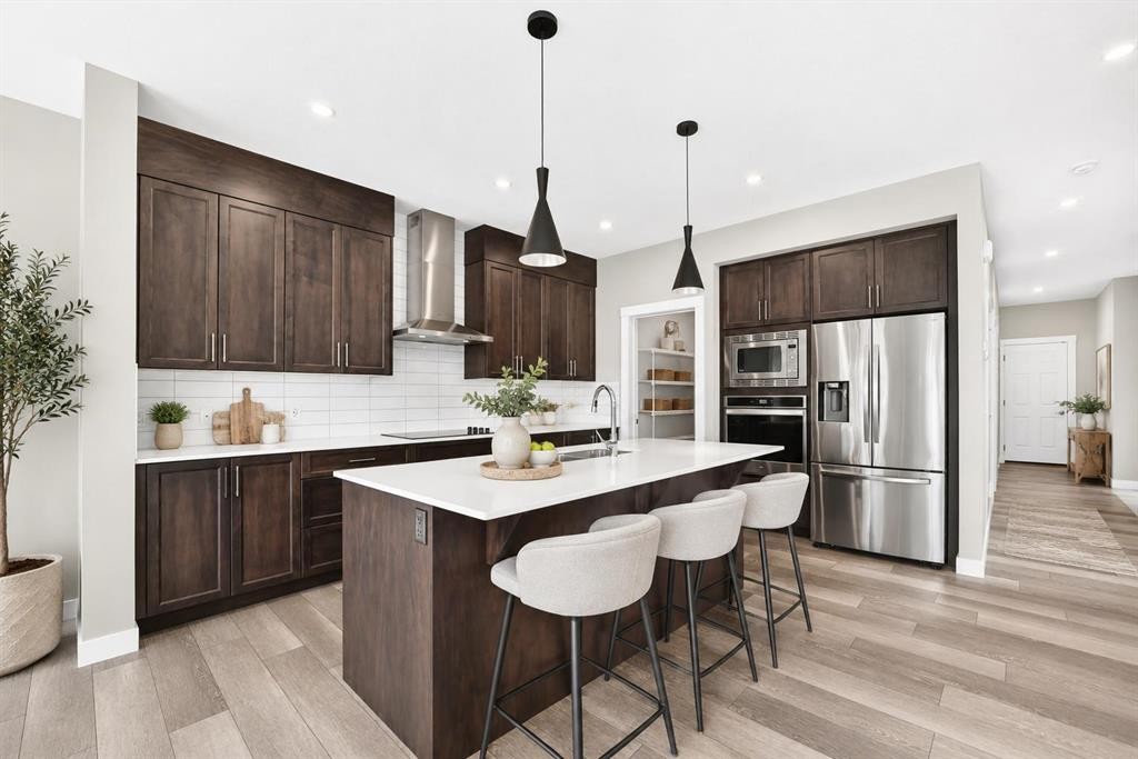 137 Creekside Way Sw, Calgary, AB - Indoor Photo Showing Kitchen With Stainless Steel Kitchen With Upgraded Kitchen
