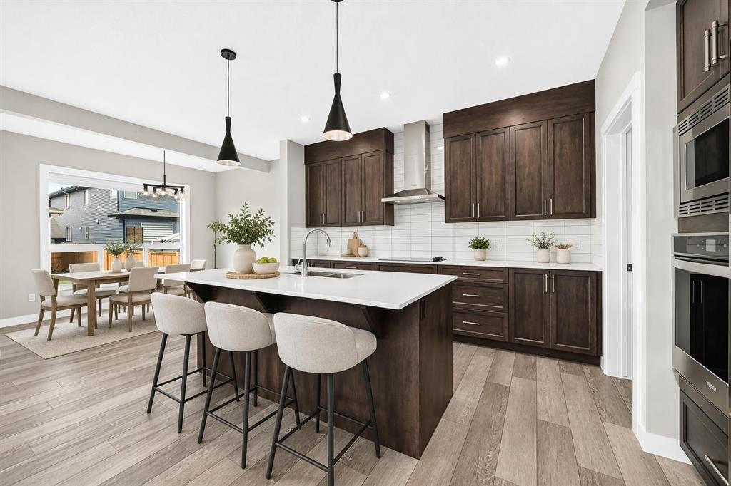 137 Creekside Way Sw, Calgary, AB - Indoor Photo Showing Kitchen With Upgraded Kitchen