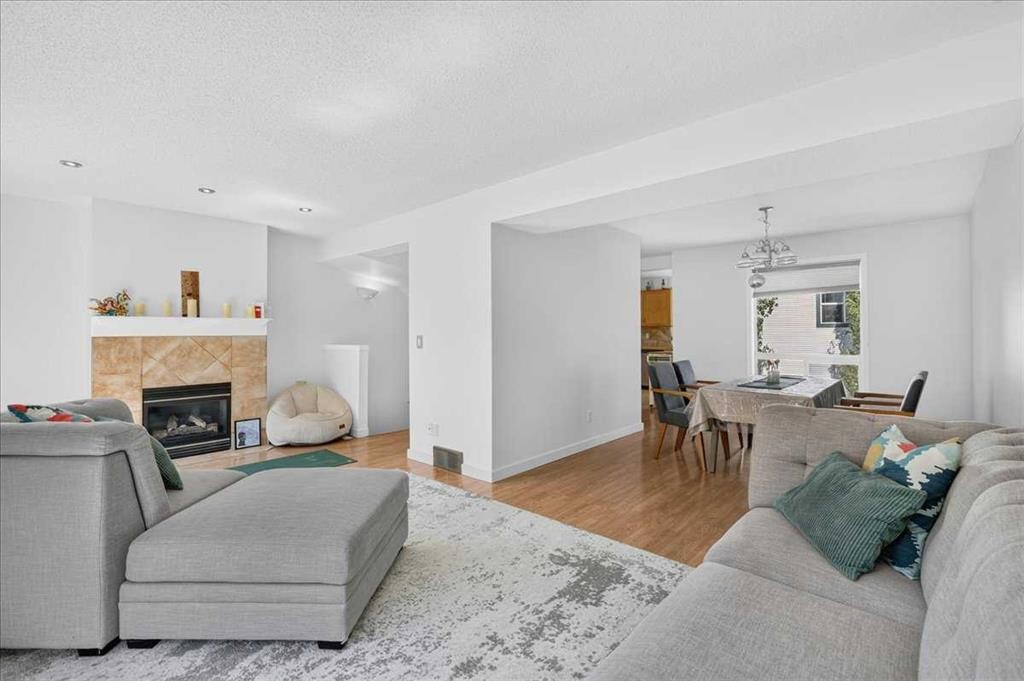 137 Bridlewood Lane Sw, Calgary, AB - Indoor Photo Showing Living Room With Fireplace