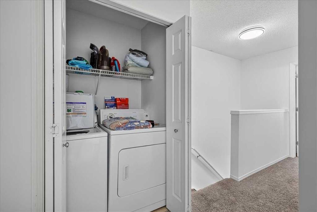 137 Bridlewood Lane Sw, Calgary, AB - Indoor Photo Showing Laundry Room