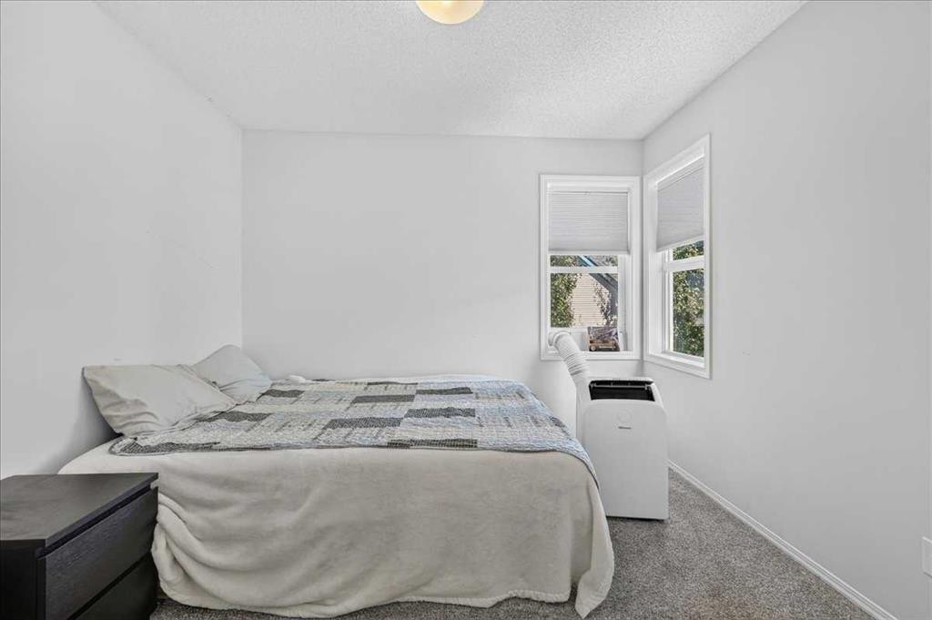 137 Bridlewood Lane Sw, Calgary, AB - Indoor Photo Showing Bedroom