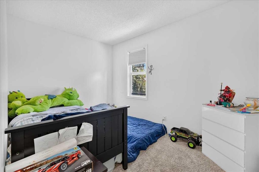 137 Bridlewood Lane Sw, Calgary, AB - Indoor Photo Showing Bedroom