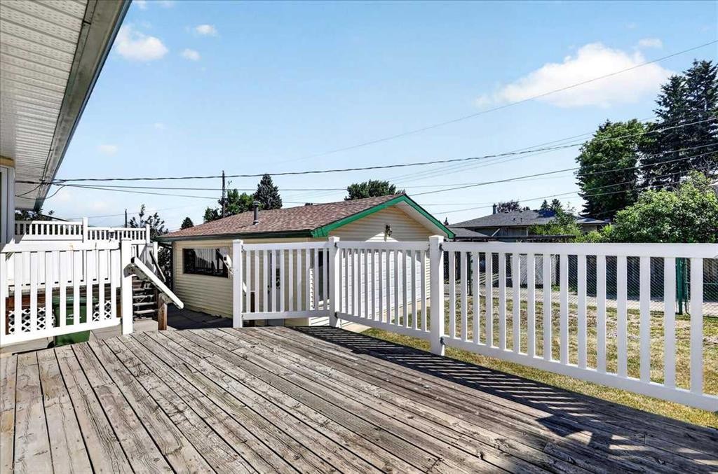 7727 Bowcliffe Crescent Nw, Calgary, AB - Outdoor With Deck Patio Veranda With Exterior