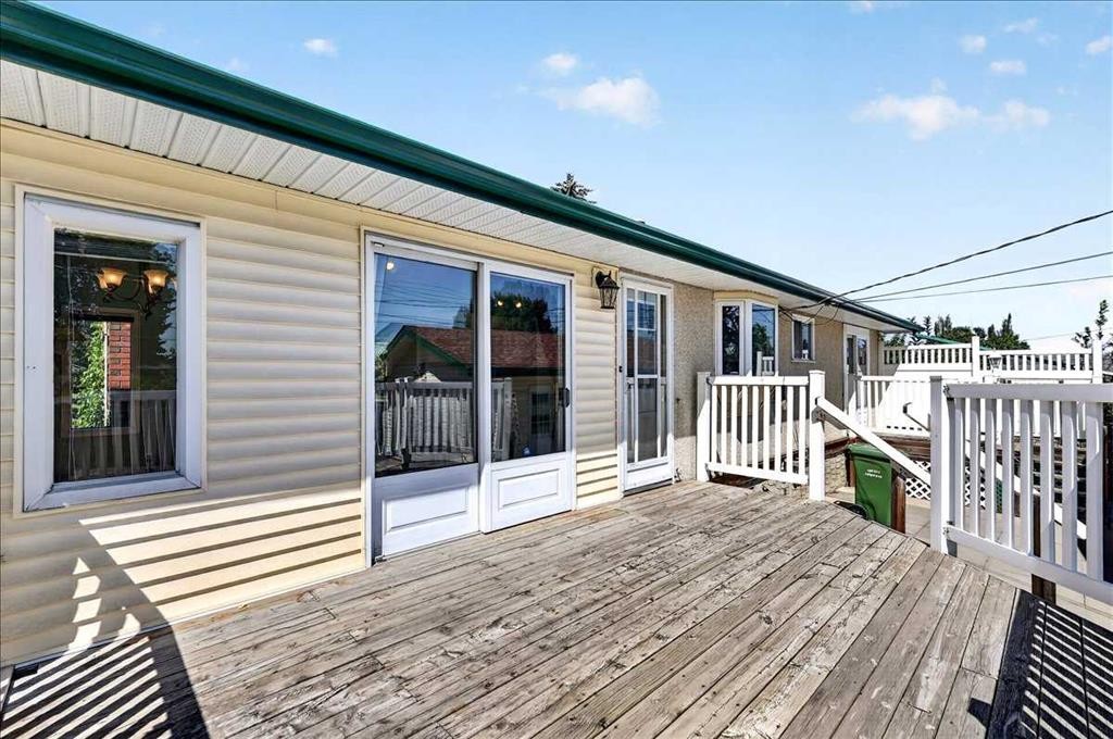 7727 Bowcliffe Crescent Nw, Calgary, AB - Outdoor With Deck Patio Veranda With Exterior