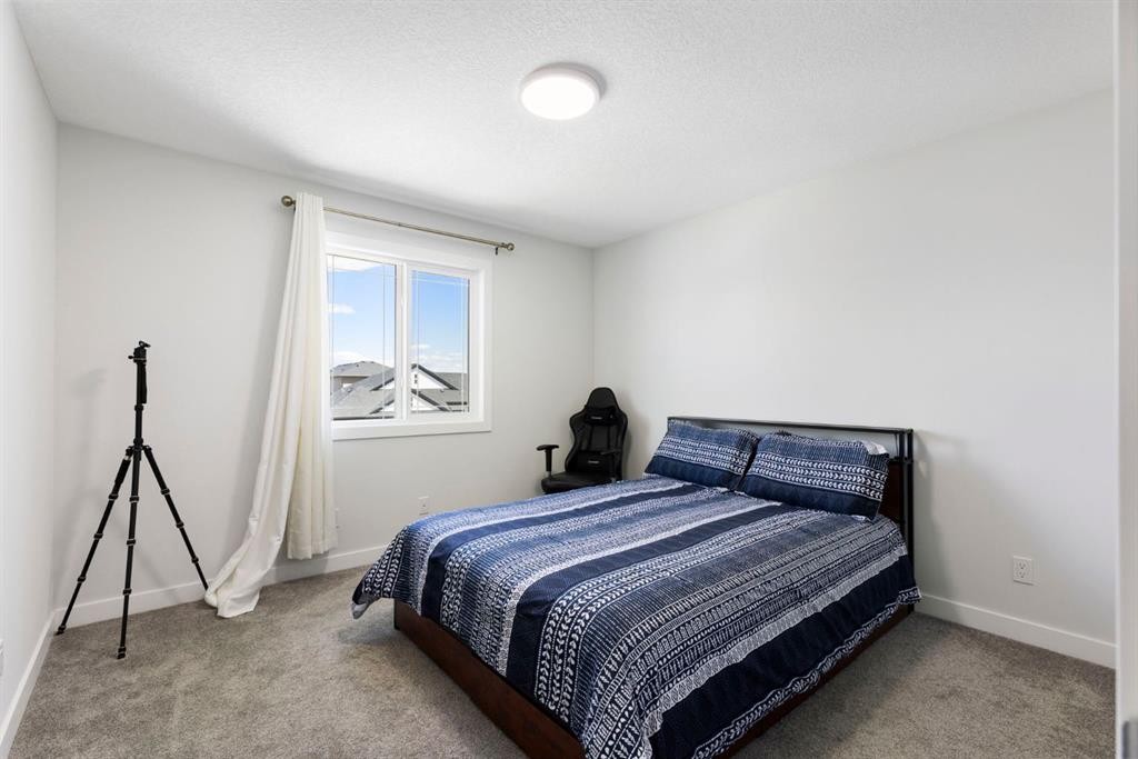 183 Brander Avenue, Langdon, AB - Indoor Photo Showing Bedroom