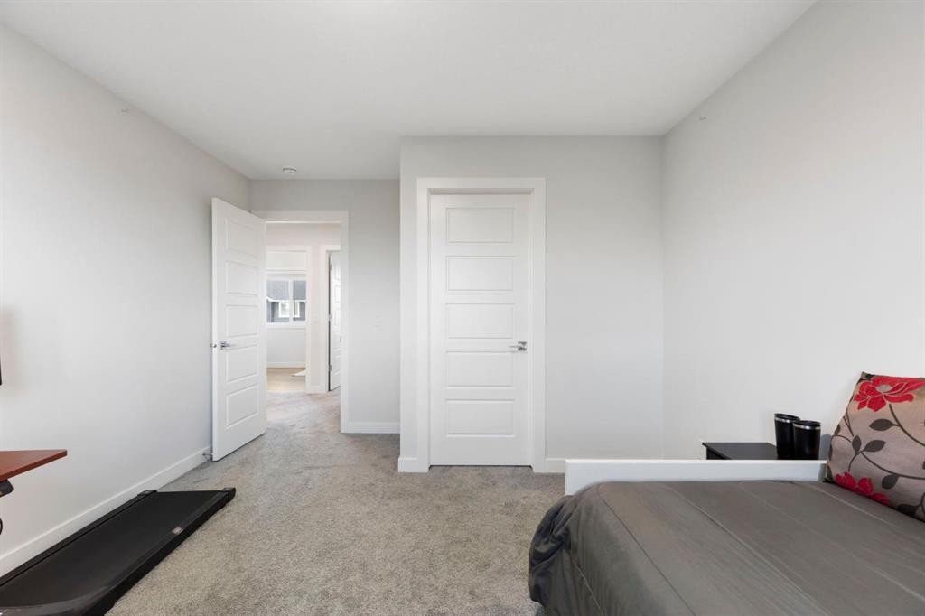 183 Brander Avenue, Langdon, AB - Indoor Photo Showing Bedroom