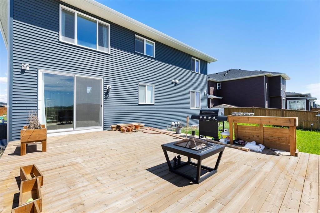 183 Brander Avenue, Langdon, AB - Outdoor With Deck Patio Veranda With Exterior