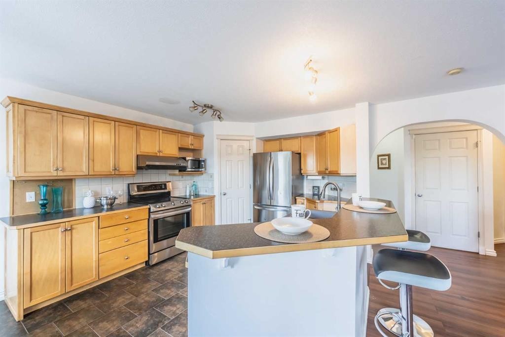 203 Coville Close Ne, Calgary, AB - Indoor Photo Showing Kitchen With Stainless Steel Kitchen