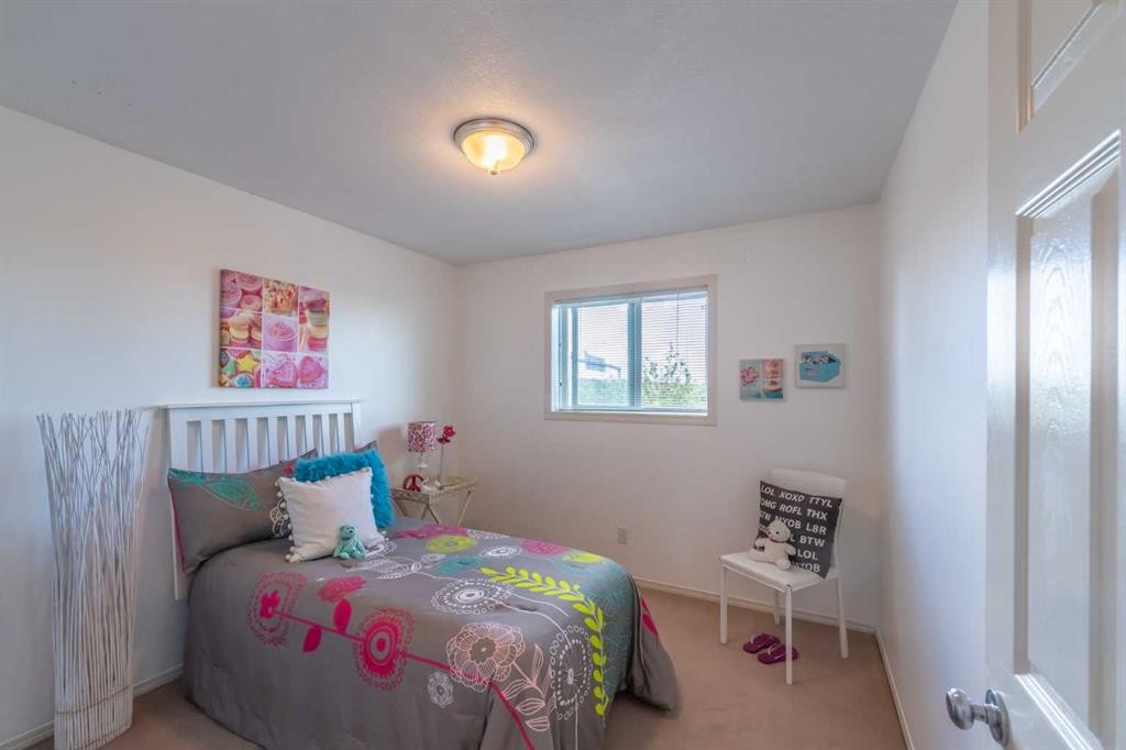 203 Coville Close Ne, Calgary, AB - Indoor Photo Showing Bedroom