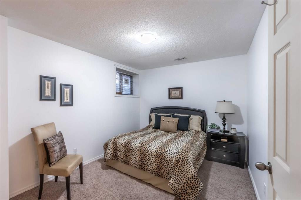 203 Coville Close Ne, Calgary, AB - Indoor Photo Showing Bedroom