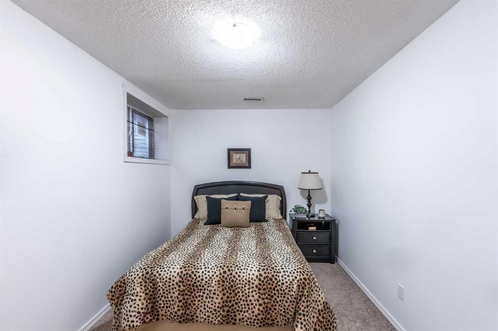 203 Coville Close Ne, Calgary, AB - Indoor Photo Showing Bedroom