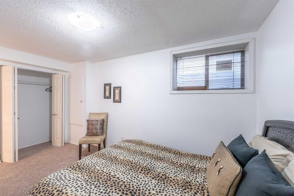 203 Coville Close Ne, Calgary, AB - Indoor Photo Showing Bedroom