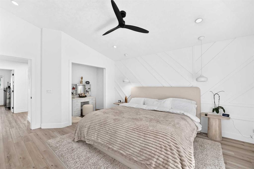 10909 Hidden Valley Drive Nw, Calgary, AB - Indoor Photo Showing Bedroom With Fireplace