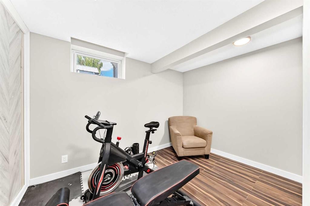 114 Midcrest Crescent Se, Calgary, AB - Indoor Photo Showing Gym Room