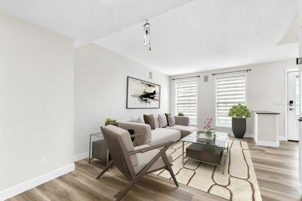 175 Prestwick Villas Se, Calgary, AB - Indoor Photo Showing Living Room