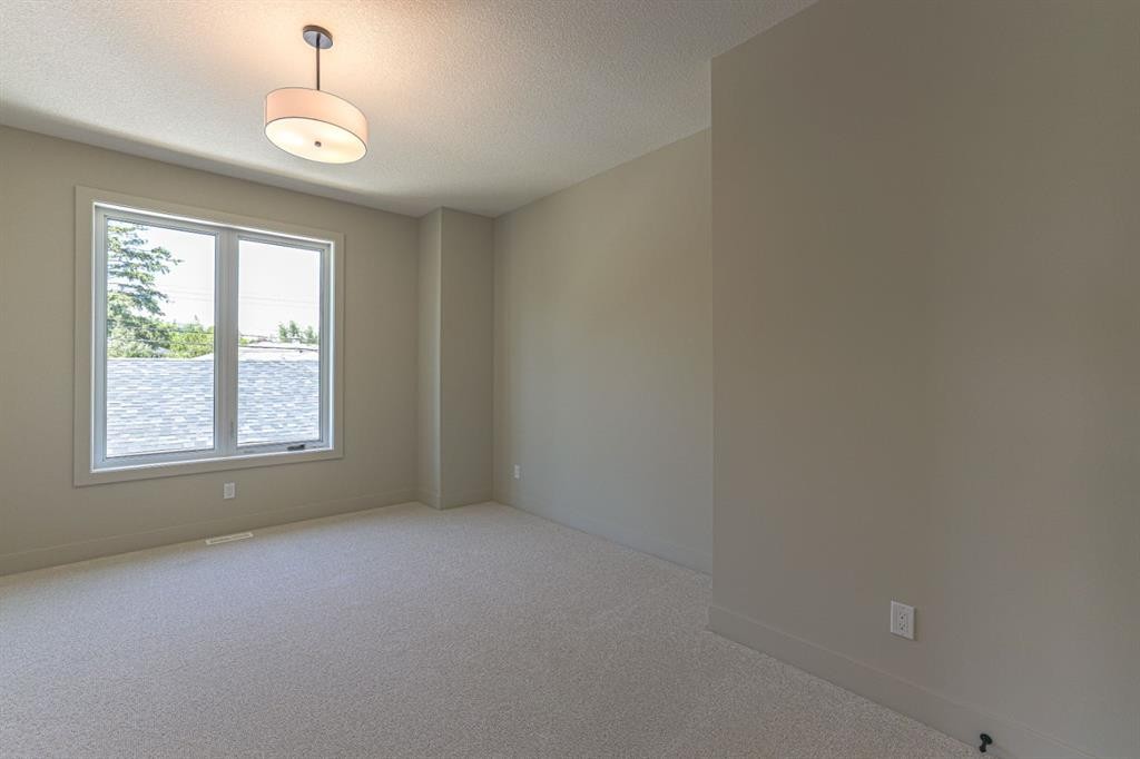 147 Heston Street Nw, Calgary, AB - Indoor Photo Showing Other Room