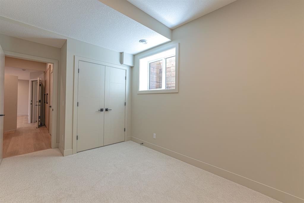 147 Heston Street Nw, Calgary, AB - Indoor Photo Showing Other Room