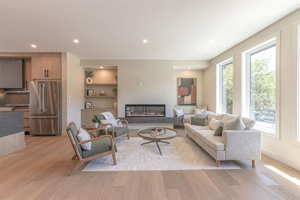 147 Heston Street Nw, Calgary, AB - Indoor Photo Showing Living Room With Fireplace