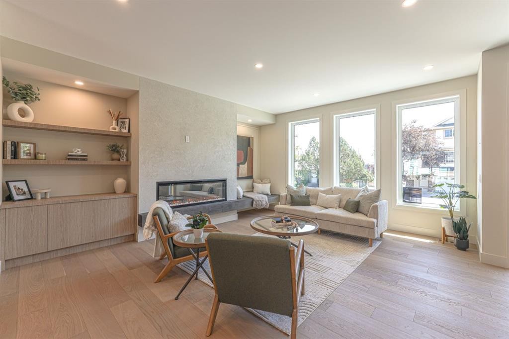 147 Heston Street Nw, Calgary, AB - Indoor Photo Showing Living Room With Fireplace