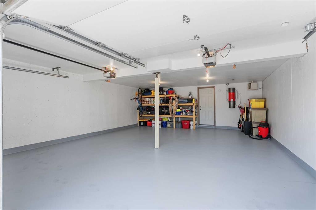 610 Aspen Meadows Hill Sw, Calgary, AB - Indoor Photo Showing Garage