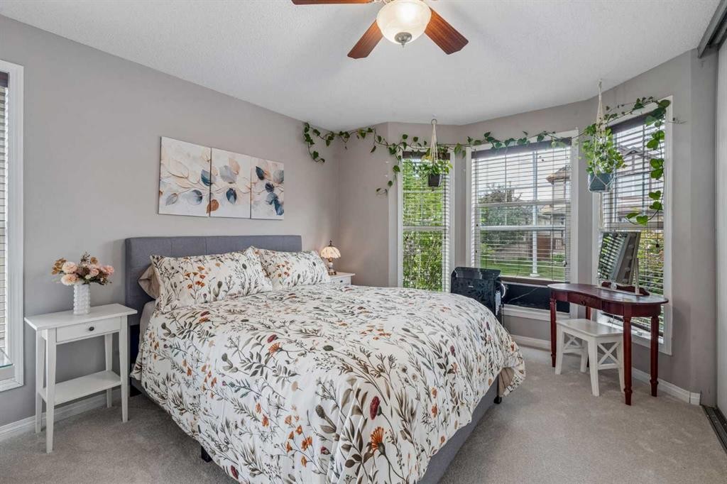 2046 New Brighton Gardens Se, Calgary, AB - Indoor Photo Showing Bedroom