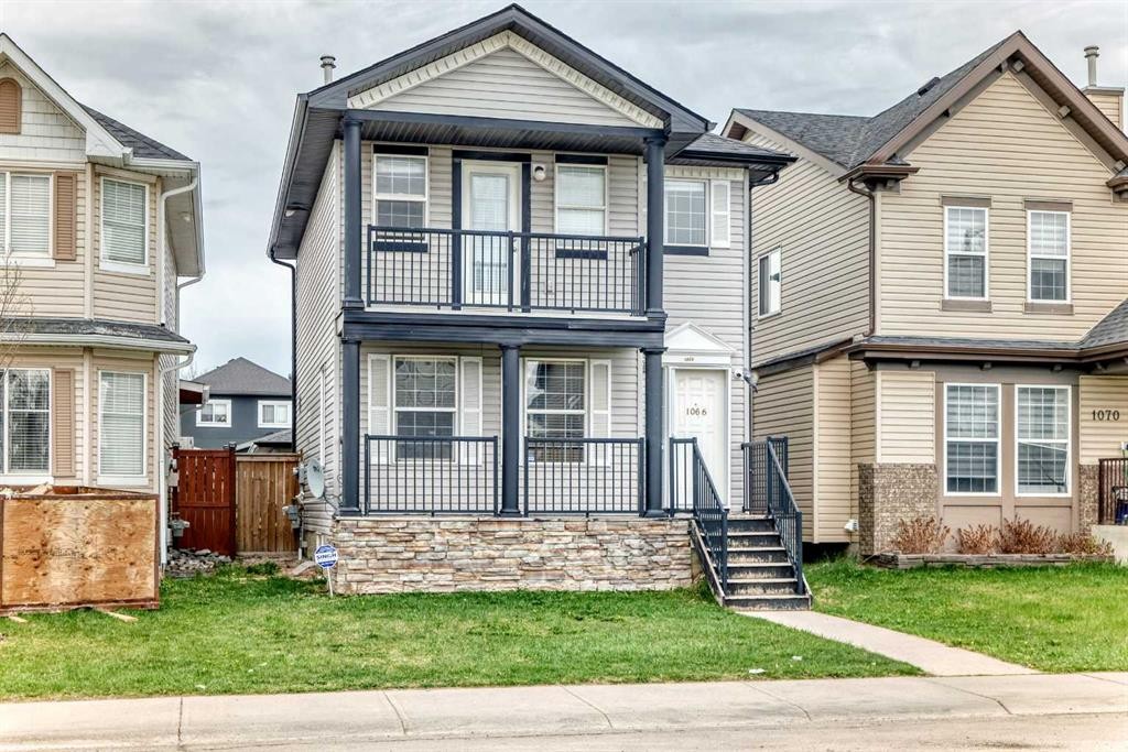 1066 Taradale Drive Ne, Calgary, AB - Outdoor With Balcony With Facade
