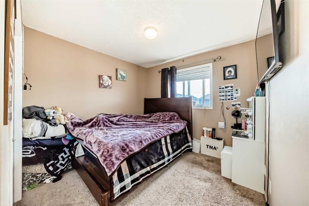 1066 Taradale Drive Ne, Calgary, AB - Indoor Photo Showing Bedroom