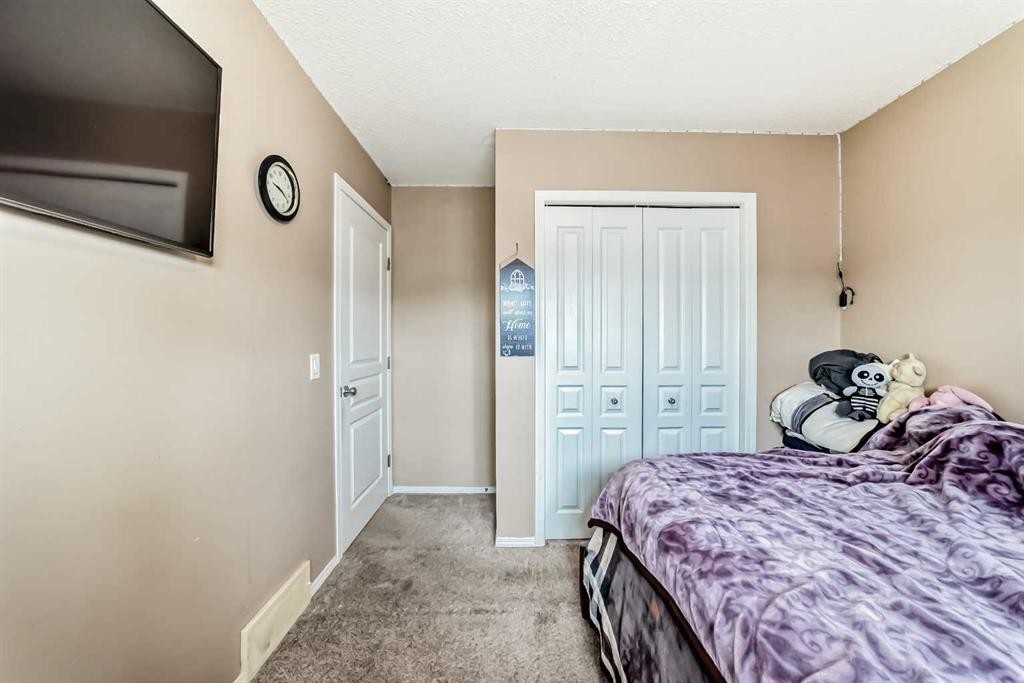 1066 Taradale Drive Ne, Calgary, AB - Indoor Photo Showing Bedroom
