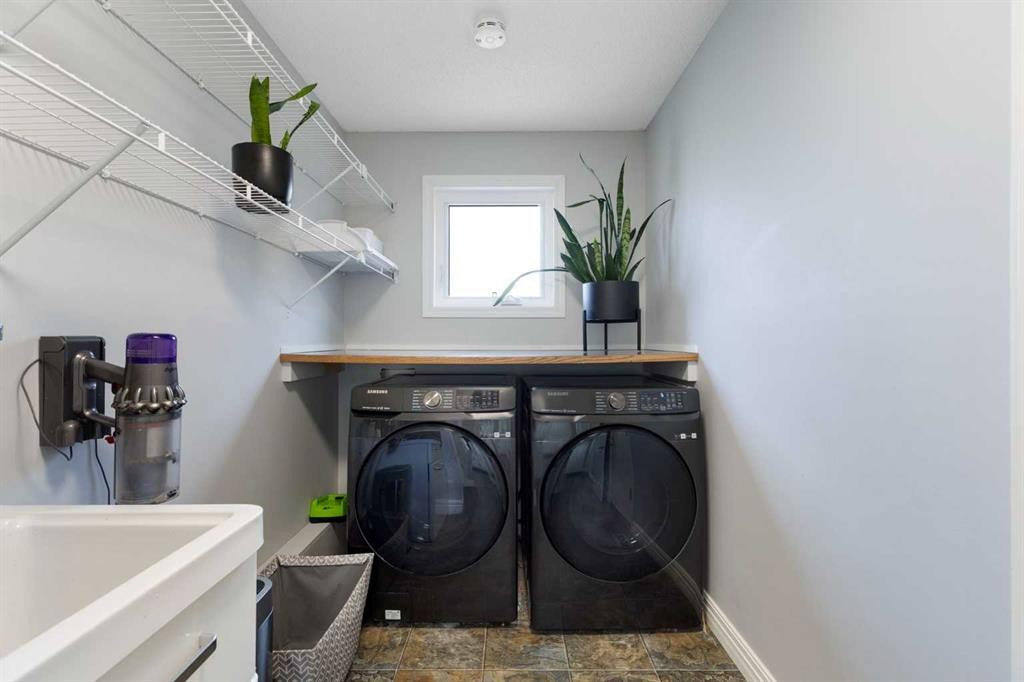 13 Somerset Park Sw, Calgary, AB - Indoor Photo Showing Laundry Room