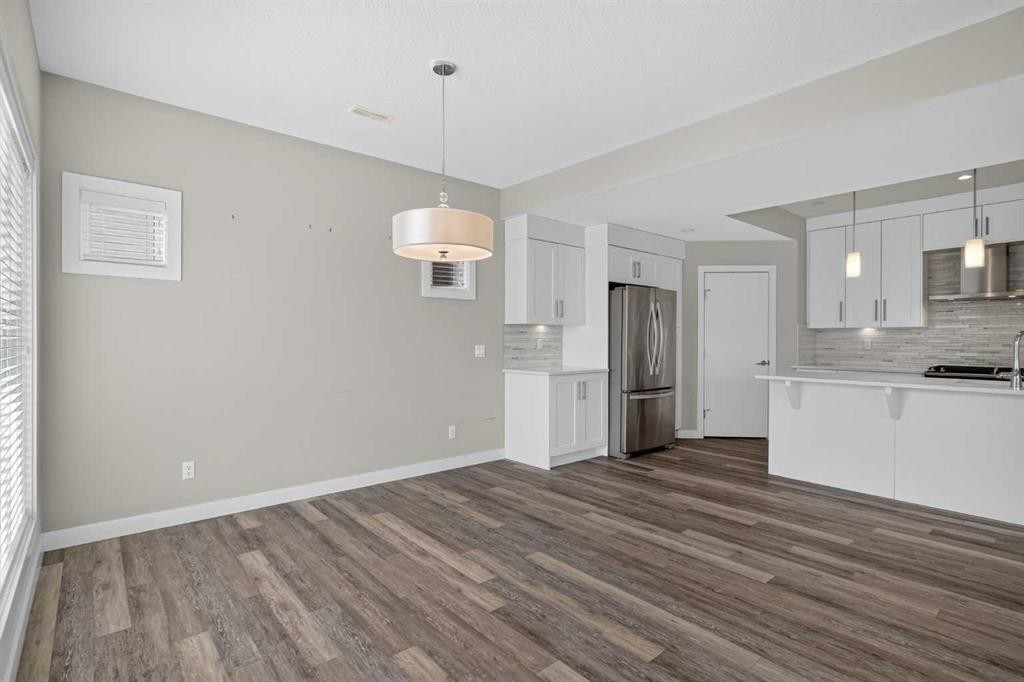 4-2416 30 Street Sw, Calgary, AB - Indoor Photo Showing Kitchen With Upgraded Kitchen