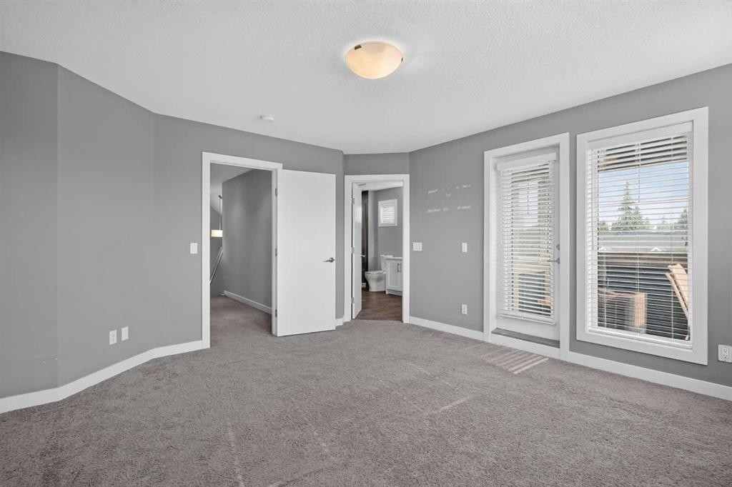 4-2416 30 Street Sw, Calgary, AB - Indoor Photo Showing Other Room
