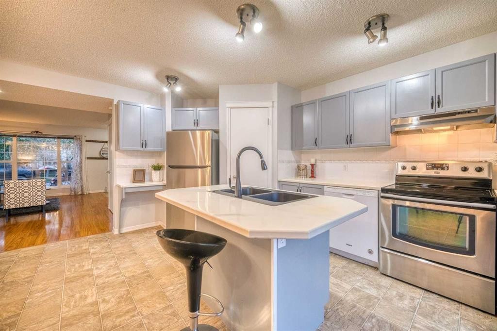 81 Prestwick Avenue Se, Calgary, AB - Indoor Photo Showing Kitchen With Double Sink