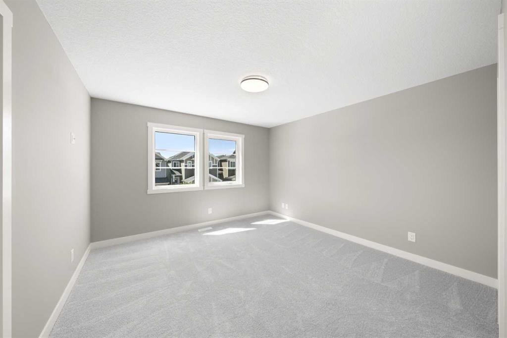 78 Sora Gardens Se, Calgary, AB - Indoor Photo Showing Other Room