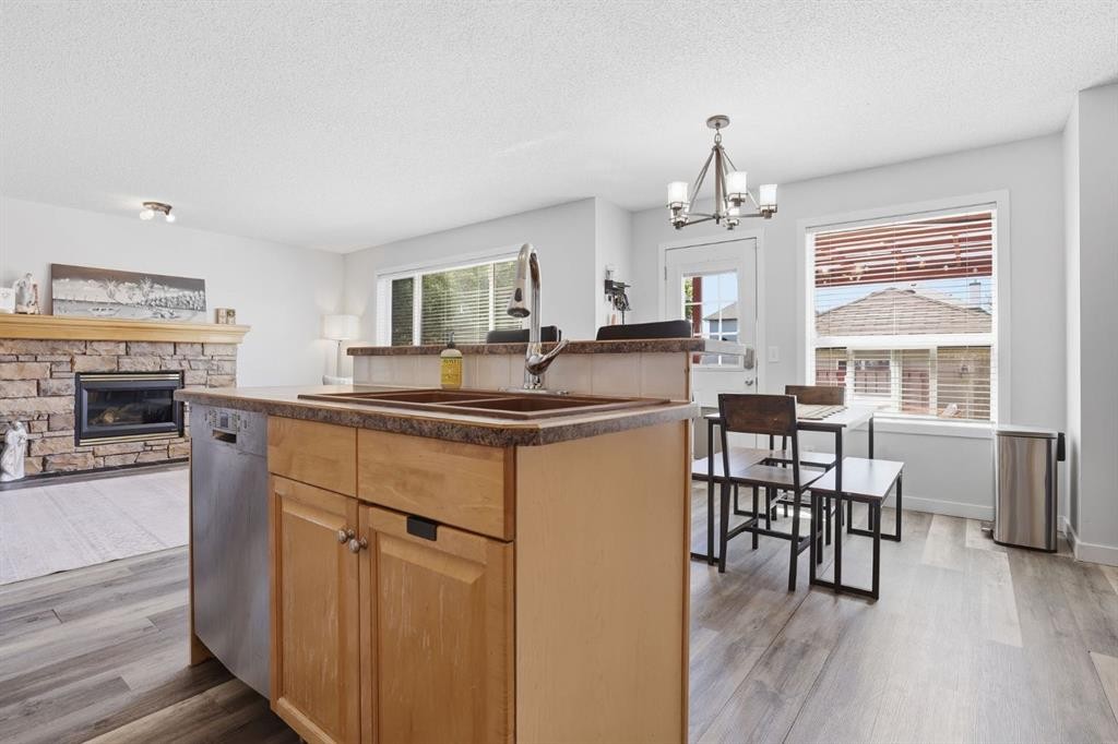 134 Prestwick Landing Se, Calgary, AB - Indoor With Fireplace