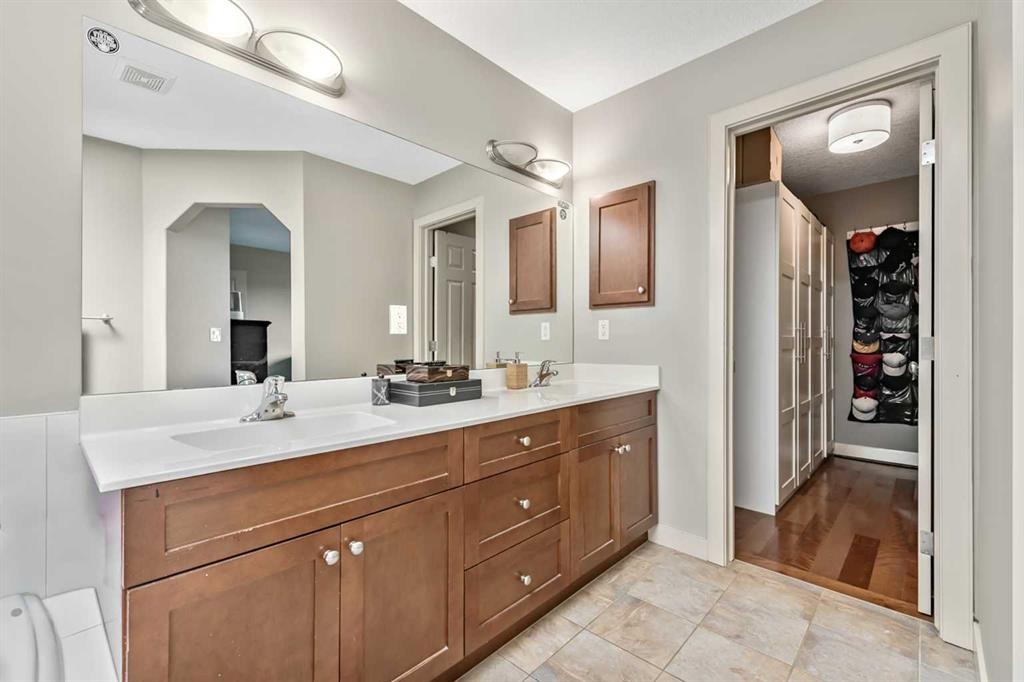 13 Dain Place Nw, Langdon, AB - Indoor Photo Showing Bathroom