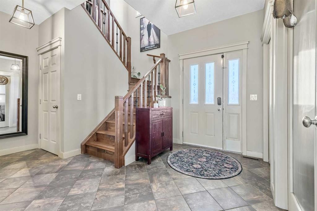 13 Dain Place Nw, Langdon, AB - Indoor Photo Showing Other Room
